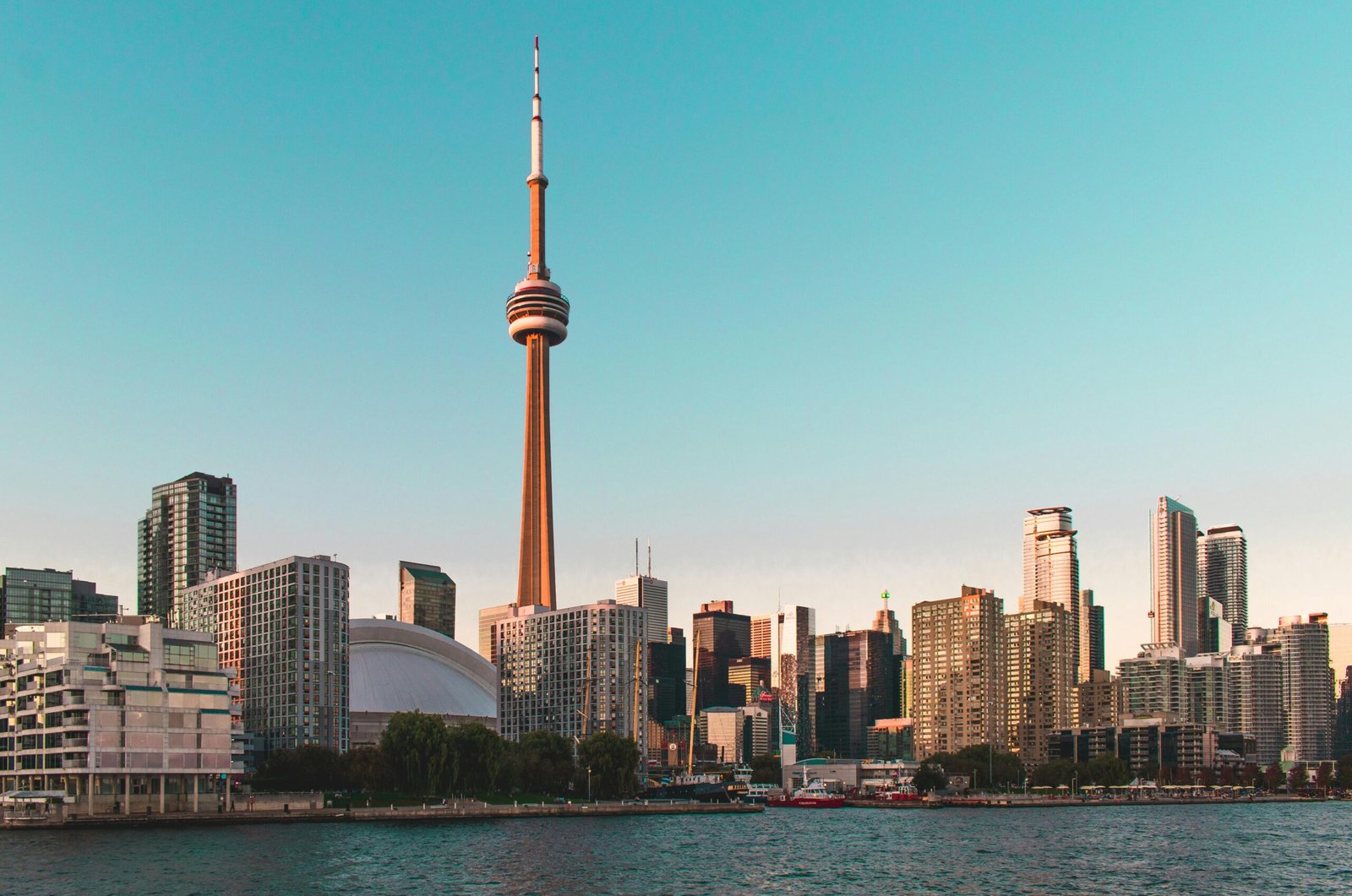 Beautiful view of Toronto's skyline featuring the iconic CN Tower during sunset.